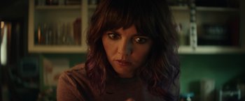 Movie still from “Timmy Failure: Mistakes Were Made” (2020), directed by Tom McCarthy – A person with purple curly hair; Close Up shot, Over the shoulder angle