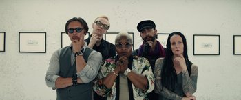 Movie still from “Timmy Failure: Mistakes Were Made” (2020), directed by Tom McCarthy – A group of people standing next to each other in a room; Medium shot, Low angle