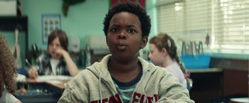 Movie still from “Timmy Failure: Mistakes Were Made” (2020), directed by Tom McCarthy – A young boy with a surprised look on his face; Close Up shot, Low angle