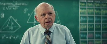 Movie still from “Timmy Failure: Mistakes Were Made” (2020), directed by Tom McCarthy – An older man wearing a shirt and a tie; Close Up shot, Over the shoulder angle