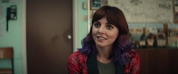 Movie still from “Timmy Failure: Mistakes Were Made” (2020), directed by Tom McCarthy – A person with purple hair; Close Up shot, Over the shoulder angle