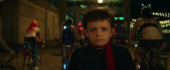 Movie still from “Timmy Failure: Mistakes Were Made” (2020), directed by Tom McCarthy – A young boy wearing a red neck tie; Close Up shot, Low angle