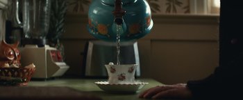 Movie still from “Timmy Failure: Mistakes Were Made” (2020), directed by Tom McCarthy – A tea pot is pouring water into a tea cup; Extreme Close Up shot, Low angle