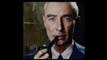 Movie still from “To End All War: Oppenheimer & the Atomic Bomb” (2023), directed by Christopher Cassel – A person smoking a pipe; Close Up shot, Overhead angle