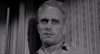 Movie still from “To Kill a Mockingbird” (1962), directed by Robert Mulligan – A black and white photo of a man with a goatee; Close Up shot, Low angle