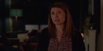 Movie still from “Together” (2021), directed by Justin Martin – A person with long brown hair; Close Up shot, Over the shoulder angle