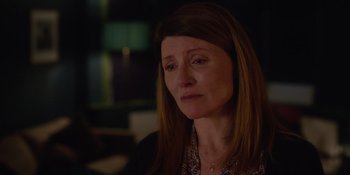 Movie still from “Together” (2021), directed by Justin Martin – A person with long brown hair; Close Up shot, Over the shoulder angle