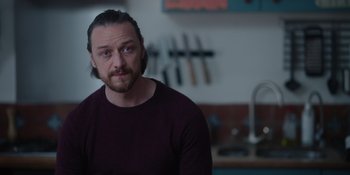 Movie still from “Together” (2021), directed by Justin Martin – A person with a beard; Close Up shot, Over the shoulder angle