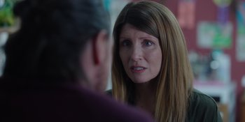 Movie still from “Together” (2021), directed by Justin Martin – A person talking to another person; Close Up shot, Over the shoulder angle