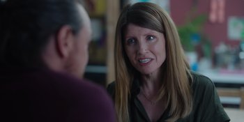 Movie still from “Together” (2021), directed by Justin Martin – A woman talking to another woman in a room; Close Up shot, Over the shoulder angle