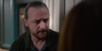 Movie still from “Together” (2021), directed by Justin Martin – A person looking at a mirror; Close Up shot, Over the shoulder angle