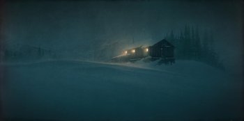 Movie still from “Togo” (2019), directed by Ericson Core – A train traveling through a snow storm at night; Extreme Wide shot, High angle