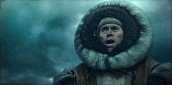 Movie still from “Togo” (2019), directed by Ericson Core – An image of a man in a fur coat; Close Up shot, Low angle