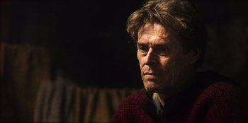 Movie still from “Togo” (2019), directed by Ericson Core – A person wearing a sweater; Close Up shot, Low angle