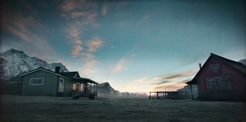 Movie still from “Togo” (2019), directed by Ericson Core – An empty lot in the middle of the sunset; Extreme Wide shot, Low angle