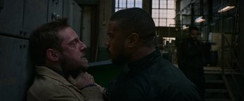 Movie still from “Without Remorse” (2021), directed by Stefano Sollima – Two men are facing each other in a room; Close Up shot, Over the shoulder angle