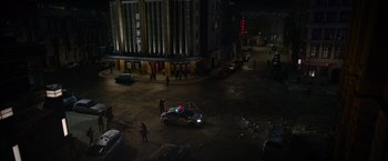 Movie still from “Without Remorse” (2021), directed by Stefano Sollima – An aerial view of a city street at night; Extreme Wide shot, High angle