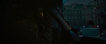 Movie still from “Without Remorse” (2021), directed by Stefano Sollima – A person sitting in a car in the dark at night; Close Up shot, Over the shoulder angle