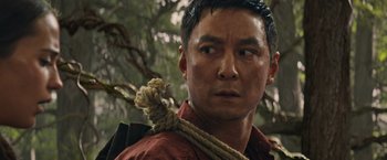 Movie still from “Tomb Raider” (2018), directed by Roar Uthaug – A person with a rope around their neck; Close Up shot, Low angle