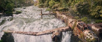 Movie still from “Tomb Raider” (2018), directed by Roar Uthaug – An old plane in the middle of a river; Extreme Wide shot, Overhead angle