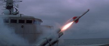 An image of a rocket being fired from a boat in the ocean