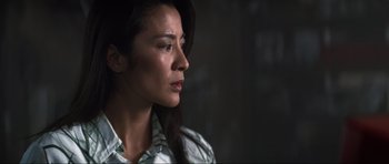 Movie still from “Tomorrow Never Dies” (1997), directed by Roger Spottiswoode – A person with long hair; Close Up shot, Low angle