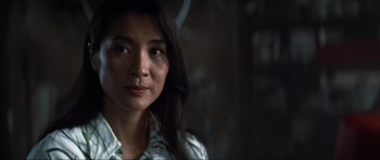 Movie still from “Tomorrow Never Dies” (1997), directed by Roger Spottiswoode – A person with long hair; Close Up shot, Low angle