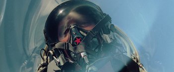 Movie still from “Top Gun” (1986), directed by Tony Scott – A fighter jet pilot's helmet; Close Up shot, Low angle