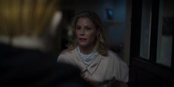 Movie still from “Totally Killer” (2023), directed by Nahnatchka Khan – A woman with blonde hair wearing a pink shirt; Close Up shot, Over the shoulder angle