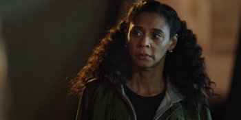 Movie still from “Totally Killer” (2023), directed by Nahnatchka Khan – A person wearing a jacket; Close Up shot, Over the shoulder angle