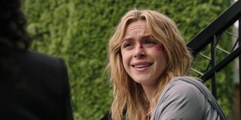 Movie still from “Totally Killer” (2023), directed by Nahnatchka Khan – A person with a bandage on her face; Close Up shot, Over the shoulder angle