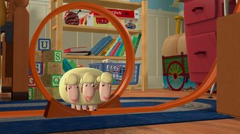 Movie still from “Toy Story” (1995), directed by John Lasseter – A group of sheep in a circle in a room; Wide shot, High angle