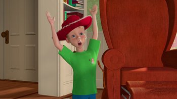 Movie still from “Toy Story” (1995), directed by John Lasseter – A cartoon of a boy with a red cowboy hat on; Medium shot, Low angle