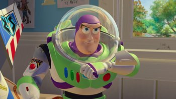Movie still from “Toy Story” (1995), directed by John Lasseter – A toy story character in a space suit; Medium shot, Over the shoulder angle