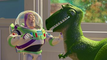 Movie still from “Toy Story” (1995), directed by John Lasseter – A toy story buzz lightyear and a t - rex; Medium shot, Over the shoulder angle