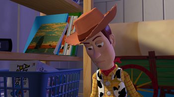 Movie still from “Toy Story” (1995), directed by John Lasseter – A toy story character wearing a cowboy hat; Medium shot, Over the shoulder angle