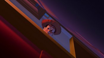 Movie still from “Toy Story” (1995), directed by John Lasseter – A toy story character looking at himself in a mirror; Extreme Wide shot, Overhead angle