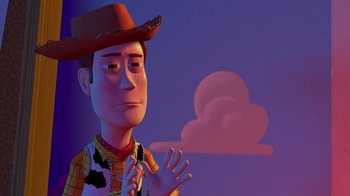 Movie still from “Toy Story” (1995), directed by John Lasseter – A toy story character in front of a cloudy sky; Close Up shot, Over the shoulder angle