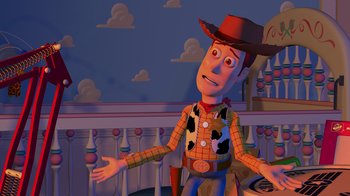 Movie still from “Toy Story” (1995), directed by John Lasseter – A man in a cowboy hat is standing in front of a bar; Medium shot, Over the shoulder angle