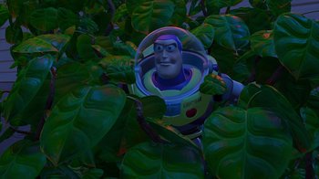 Movie still from “Toy Story” (1995), directed by John Lasseter – Buzz lightyear in a suit of buzz lightyear in a suit of buzz lightyear; Wide shot, High angle