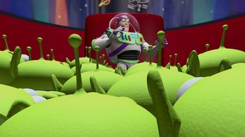 Movie still from “Toy Story” (1995), directed by John Lasseter – An animated character is in a field of green plants; Wide shot, High angle