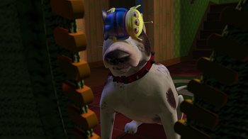 Movie still from “Toy Story” (1995), directed by John Lasseter – A dog wearing a toy helmet on its head; Medium shot, High angle