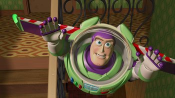 Movie still from “Toy Story” (1995), directed by John Lasseter – A toy story character; Medium shot, Low angle