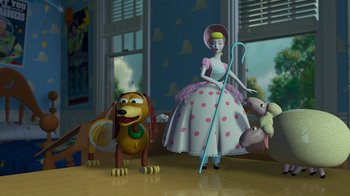 Movie still from “Toy Story” (1995), directed by John Lasseter – A toy dog and a toy woman in a room; Wide shot, Low angle