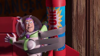Movie still from “Toy Story” (1995), directed by John Lasseter – Buzz lightyear toy in a toy story movie scene; Medium shot, Low angle