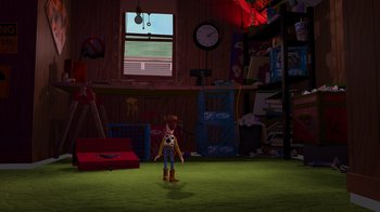 Movie still from “Toy Story” (1995), directed by John Lasseter – A toy story character is standing in a toy room; Extreme Wide shot, High angle