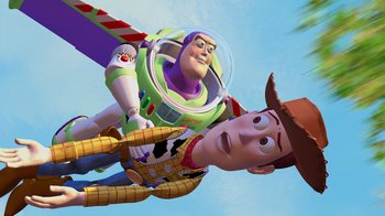 Movie still from “Toy Story” (1995), directed by John Lasseter – Two toy story characters flying in the air; Wide shot, Low angle