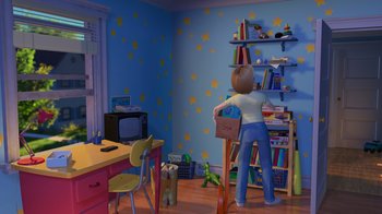 Movie still from “Toy Story 2” (1999), directed by Lee Unkrich – A woman standing in front of a bookshelf in a child's room; Wide shot, High angle