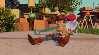 Movie still from “Toy Story 2” (1999), directed by Lee Unkrich – A toy story character laying on the ground; Wide shot, High angle