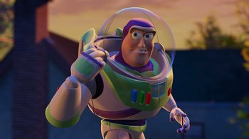 Movie still from “Toy Story 2” (1999), directed by Lee Unkrich – Buzz lightyear is wearing a space suit and helmet; Medium shot, Low angle